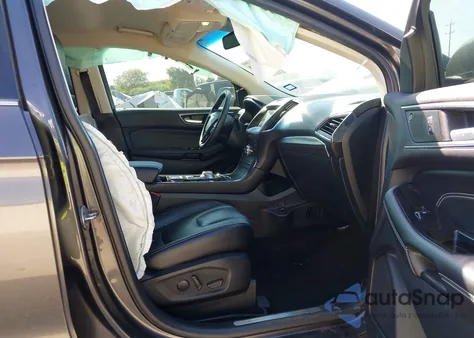 2020 Ford Edge Titanium z USA, uszkodzony, nr VIN 2FMPK3K9XLBA98670